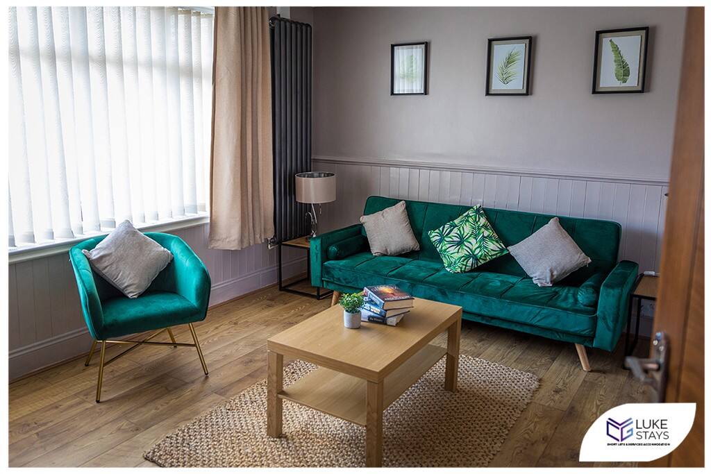 green living room at Luke Stays short term rental properties